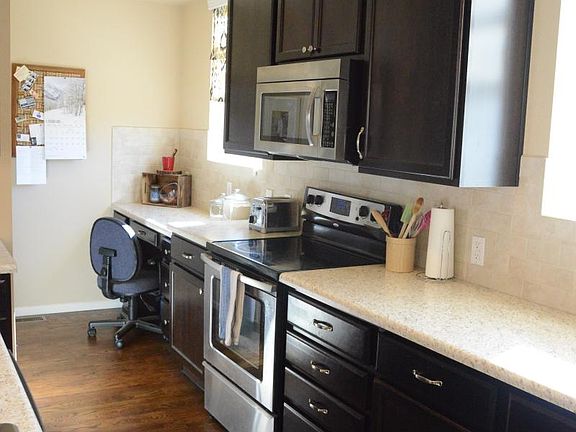 Kitchen with desk space and 1/2 bath
