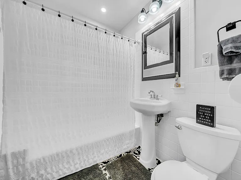 Bathroom in between both bedrooms