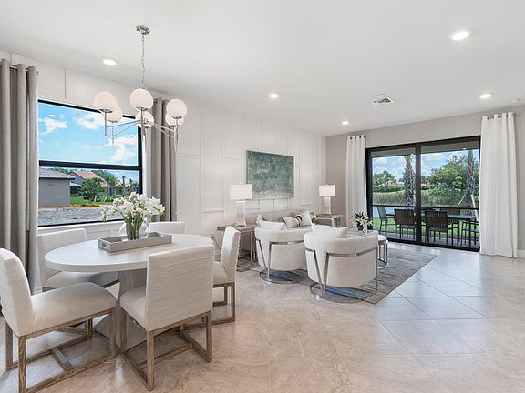 Model Representation Cafe dining conveniently located off of the kitchen