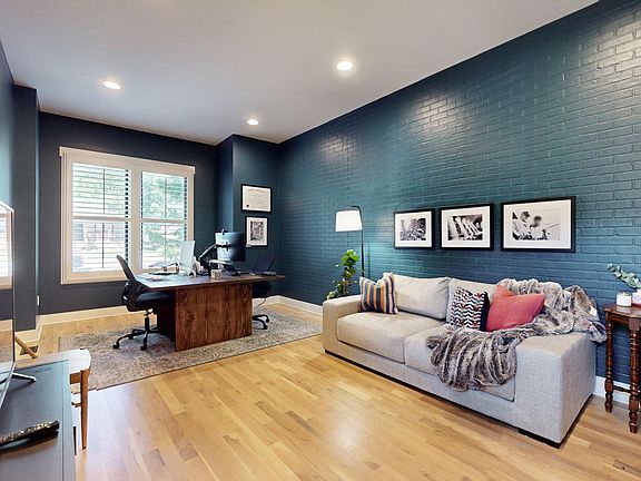 Bedroom/flex room currently used as a home office area