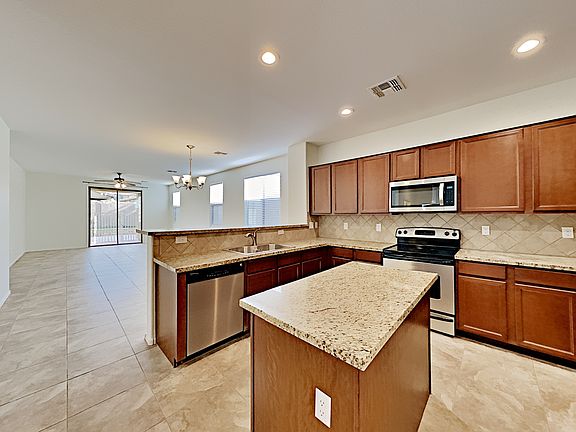 5th image of 4595 W Federal Way