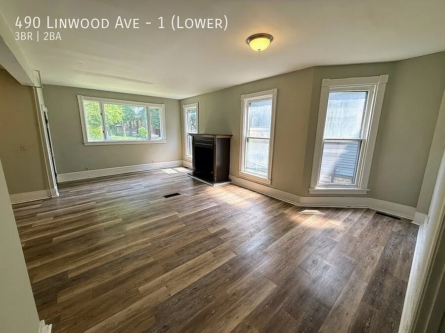 Impressive Elmwood lower-level 3-bedroom, 1.5-bath apartment with 1,500 square feet of living space — Photo 3