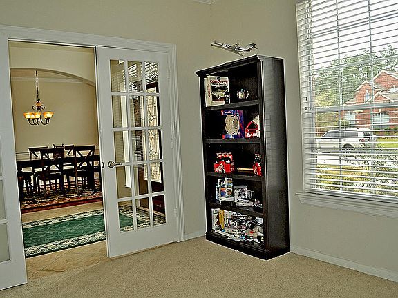 French Doors welcome you into the Study; a Quiet location... Could also be Formal Living
