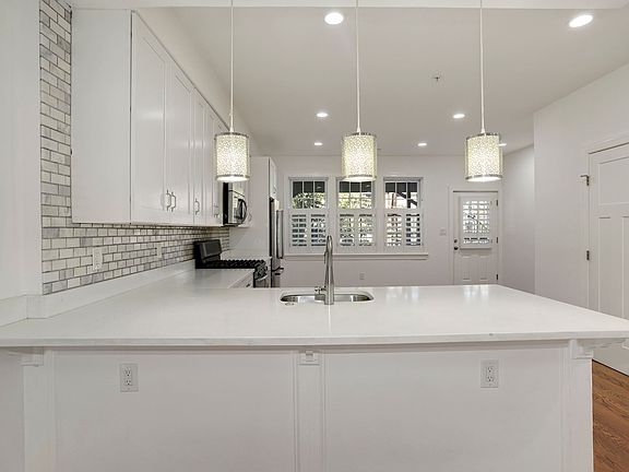 Pendant lights at counter-top seating