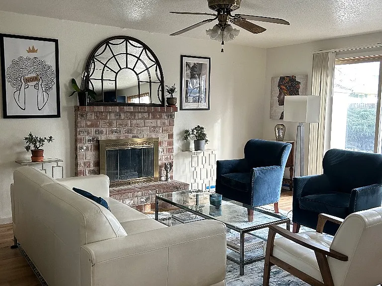 Family room attached to the kitchen with access to the backyard