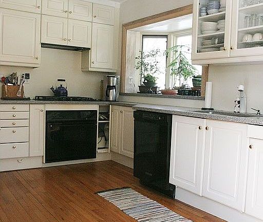 2 bay windows and solid surface counters.