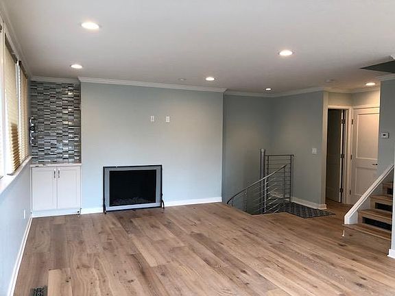 Great Room with gas Fireplace with Glass Rock