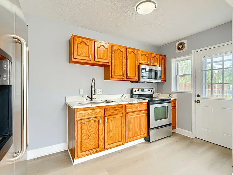 KITCHEN w/ GRANITE COUNTERS