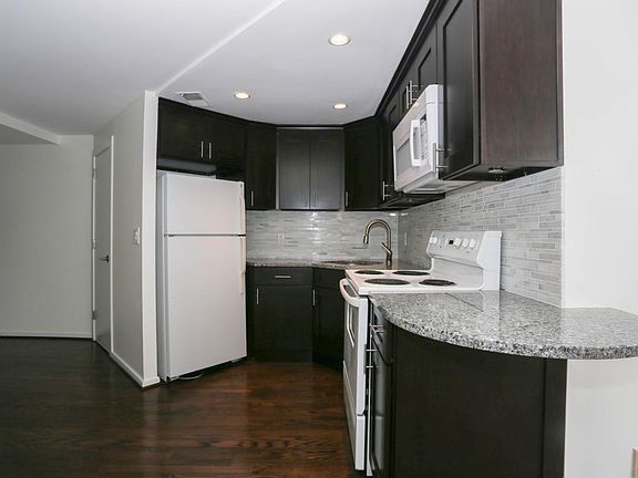 Open Kitchen Layout with Contemporary Finishes