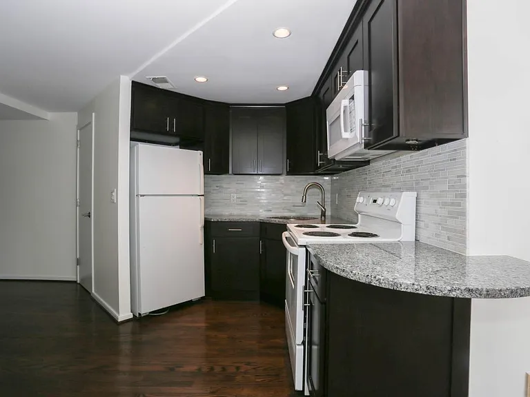 Open Kitchen Layout with Contemporary Finishes