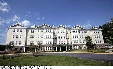 Beautifully landscaped exterior with secure access into elevator interior