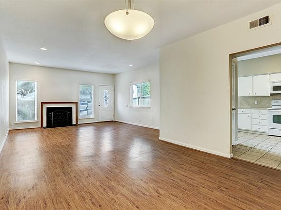 Living room and dining room are open concept.