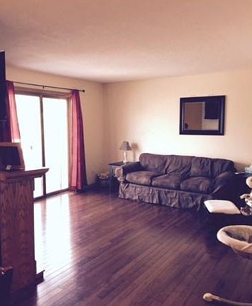 Living room with sliding door to the deck