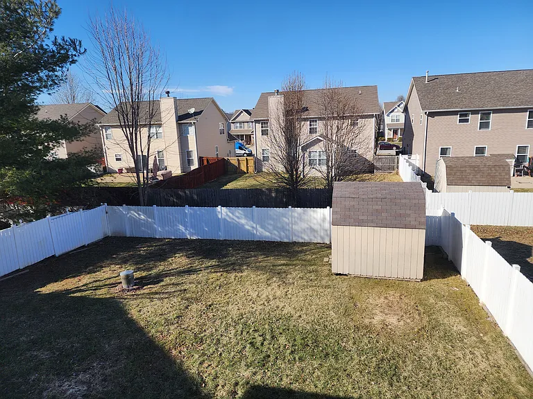 Private, fully fenced in back yard.
Storage barn