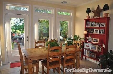 Dining room
						:
						French doors looking out to deck