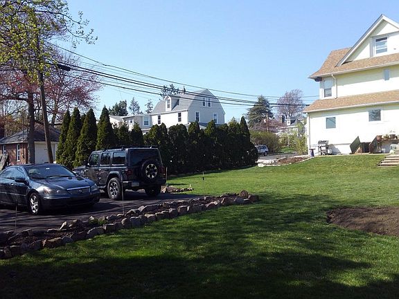 Rear view of property & off-street parking.