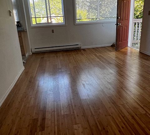 Living room with bright light, new floor.
