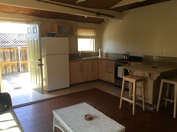 Open kitchen; hardwood floors