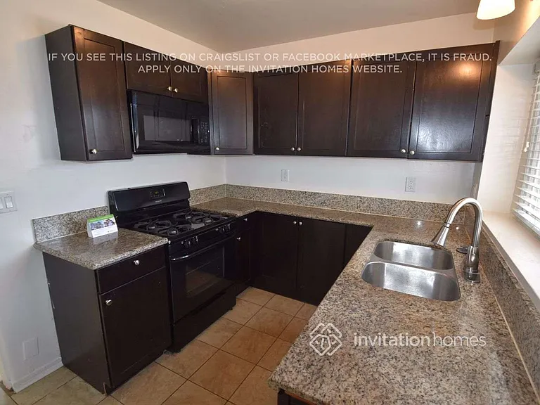 8947 S Denker Ave — Photo 5
