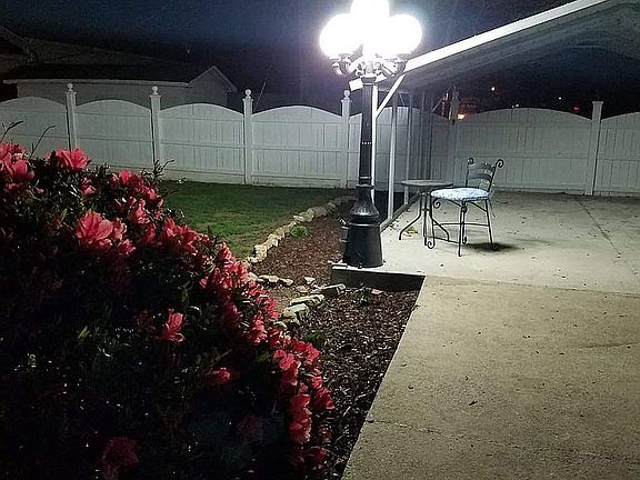 BACK YARD PATIO/CARPORT