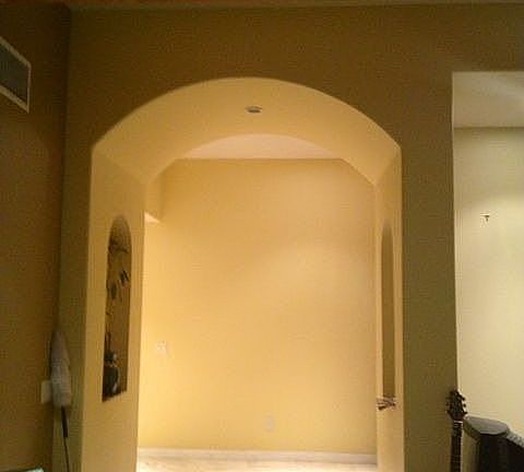 Arched entrance with insets 