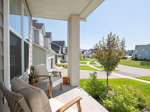 Front porch with space for seating and perfect for morning coffee!