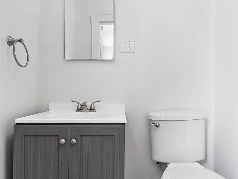Ensuite half bath in bedroom upstairs.