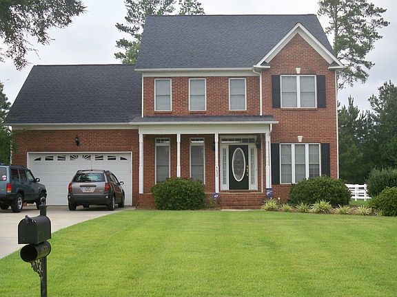 Large front yard and driveway