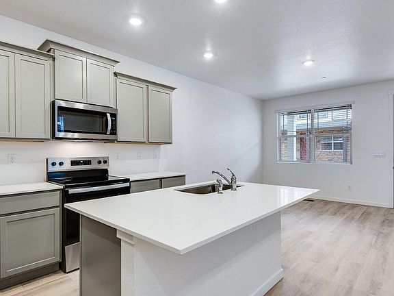 4th image of 18804 E 99th Avenue