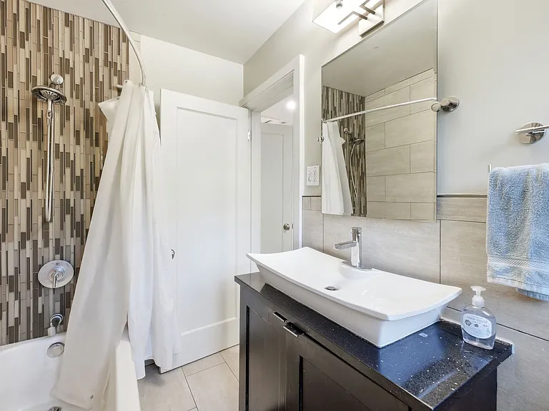 2nd full bathroom with tub upstairs.