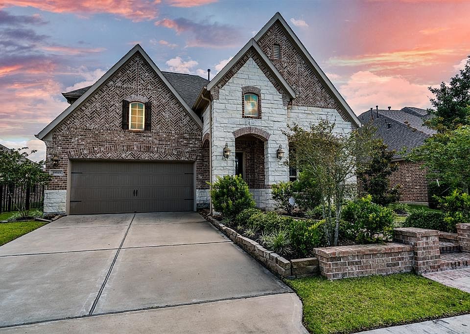 Welcome home to 19515 Bella Arbor Lane in the master planned community of Water Haven at Bridgeland in Cypress, Texas.