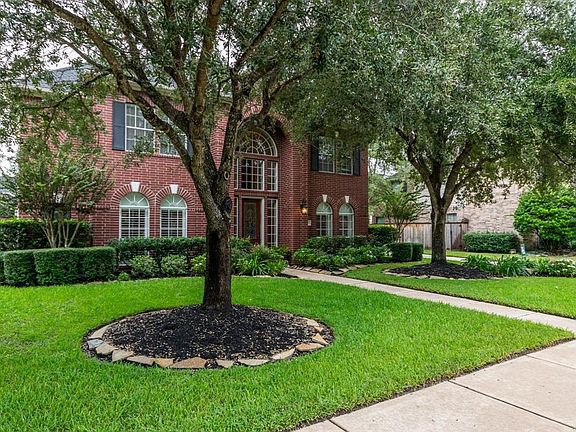 Gorgeous mature landscaping surround the property.