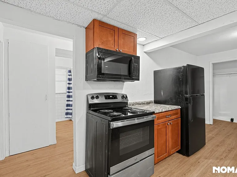 8915 N Orleans Ave — Photo 7