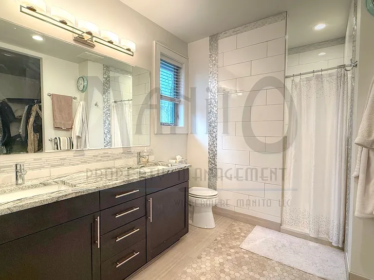 947 E 32nd Ave — Photo 10