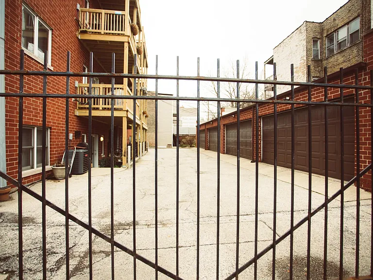 one secured garage parking spot