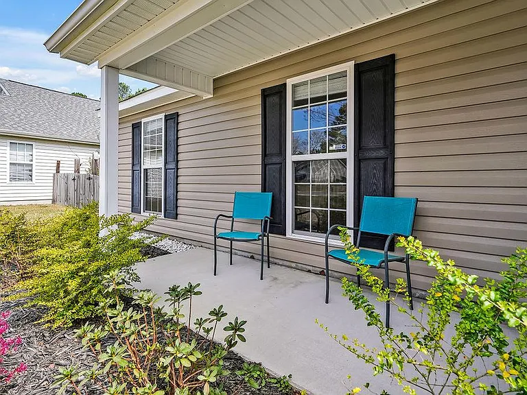 Front patio with bushes planted last year