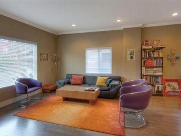 Spacious living room with large windows