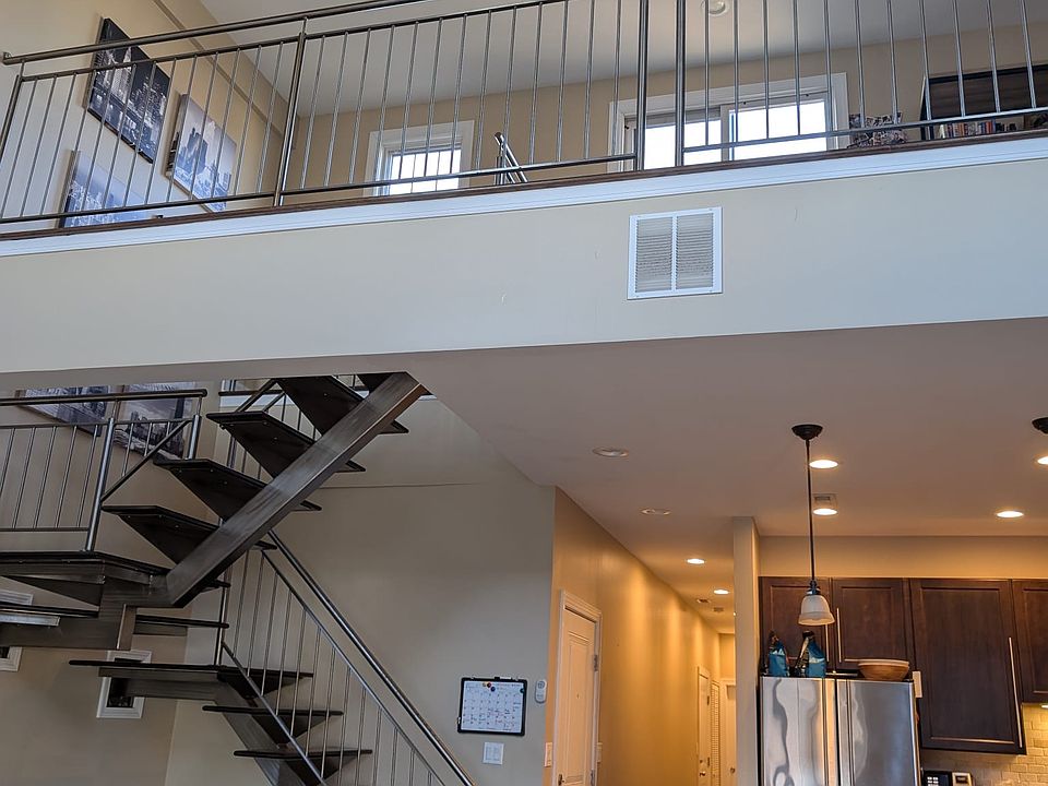Stairs from kitchen to loft/private roof deck