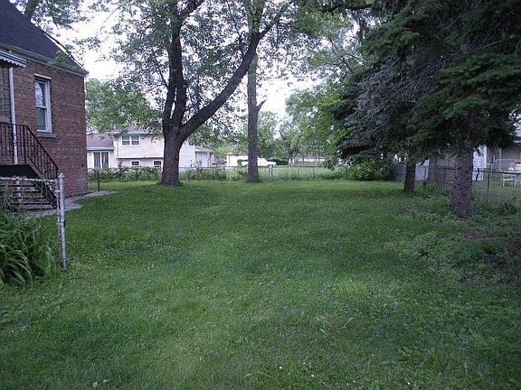 Side of house and yard