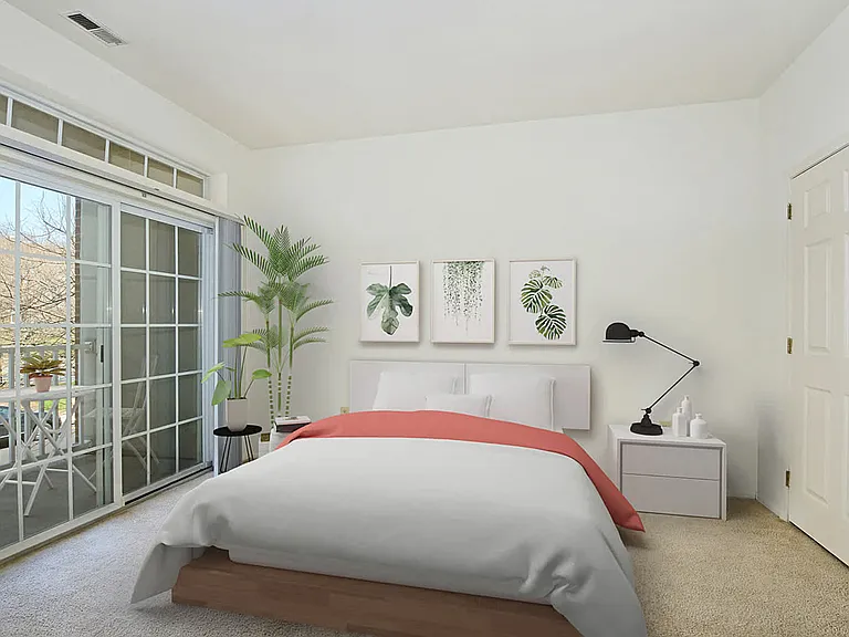 Carpeted Bedroom with Balcony