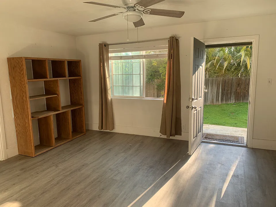 Main entrance with security screen door.