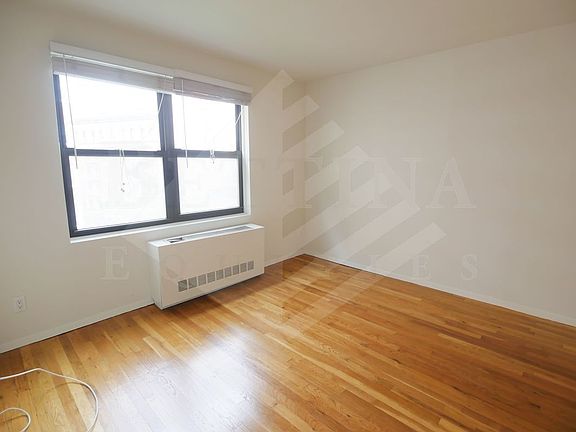 5th image of 70 E 12th St APT 7C