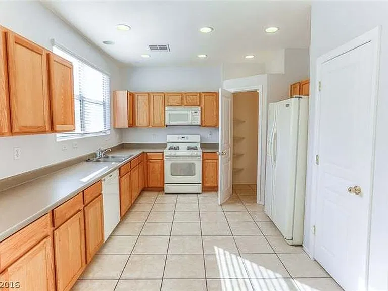 8936 Partridge Hill St — Photo 14