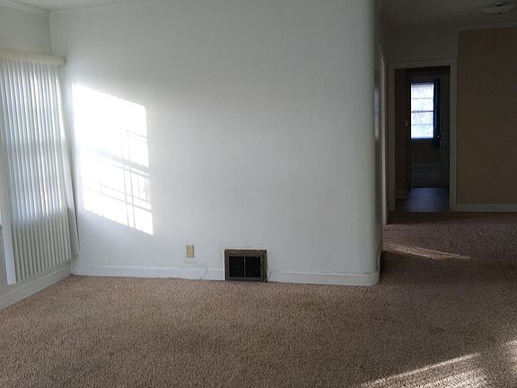 Large living room. Plenty of windows.