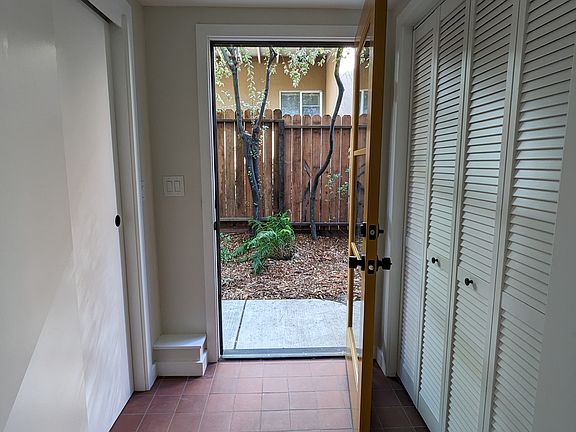 Entryway with coat closet and in unit laundry