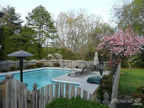 inground private L-shaped pool