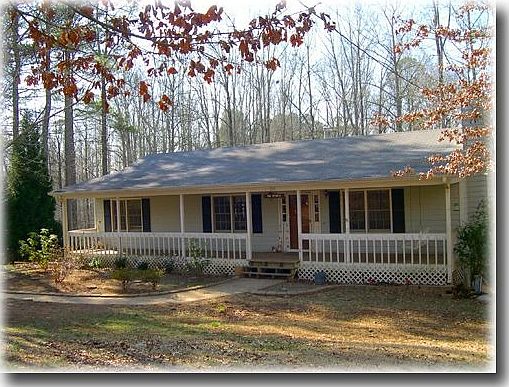 Ranch Home with Great Rocking Chair Front Porch