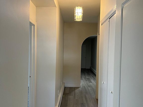 view down long hallway from front door