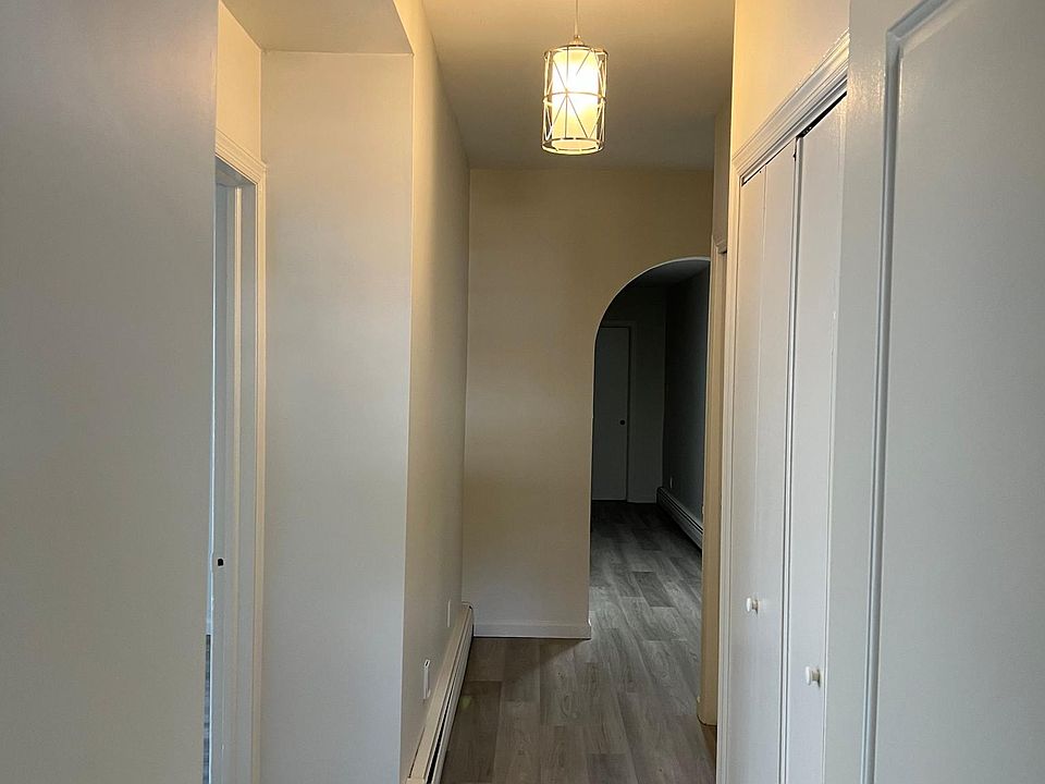 view down long hallway from front door
