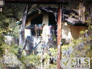 This home offers a serene 1/2 acre lot.